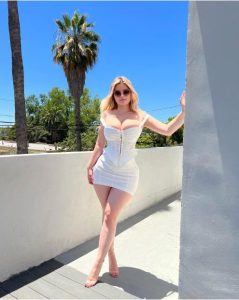 Anastasiya Kvitko shows off her figure in an enchanting white dress